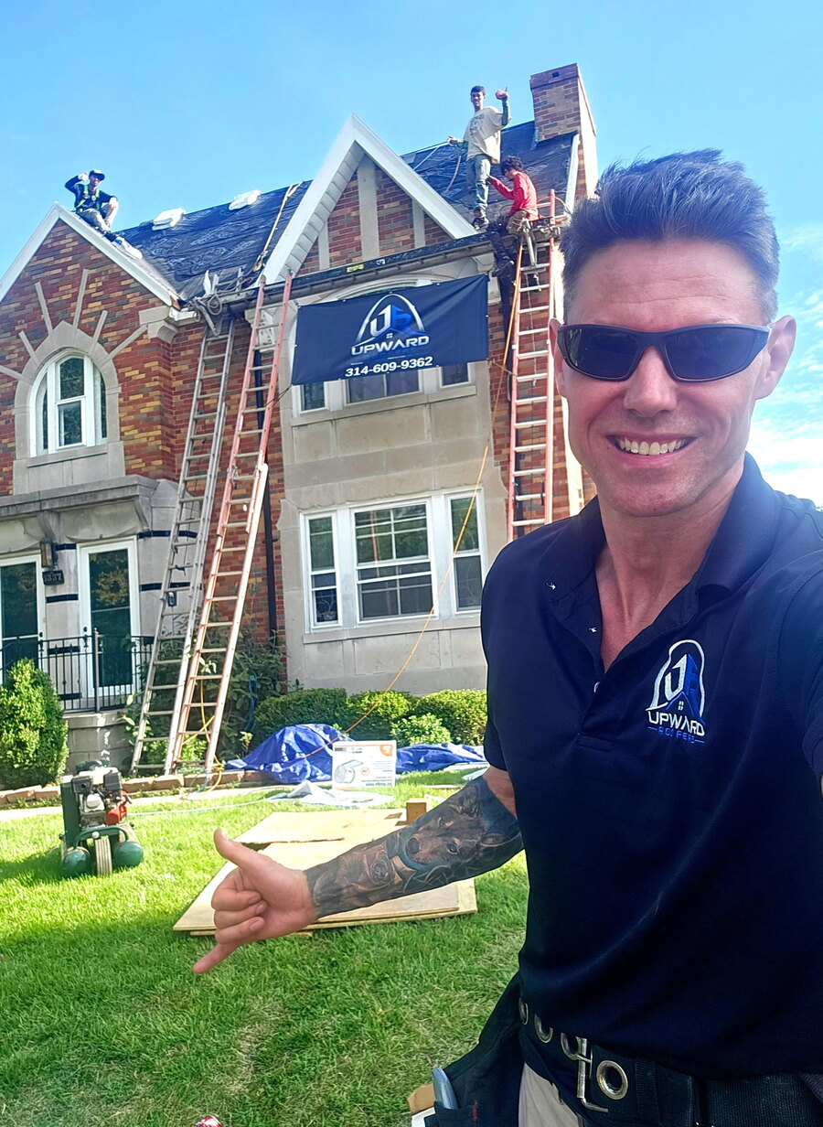 Steven Ward on-site as his crew works on a roof installation in St. Louis